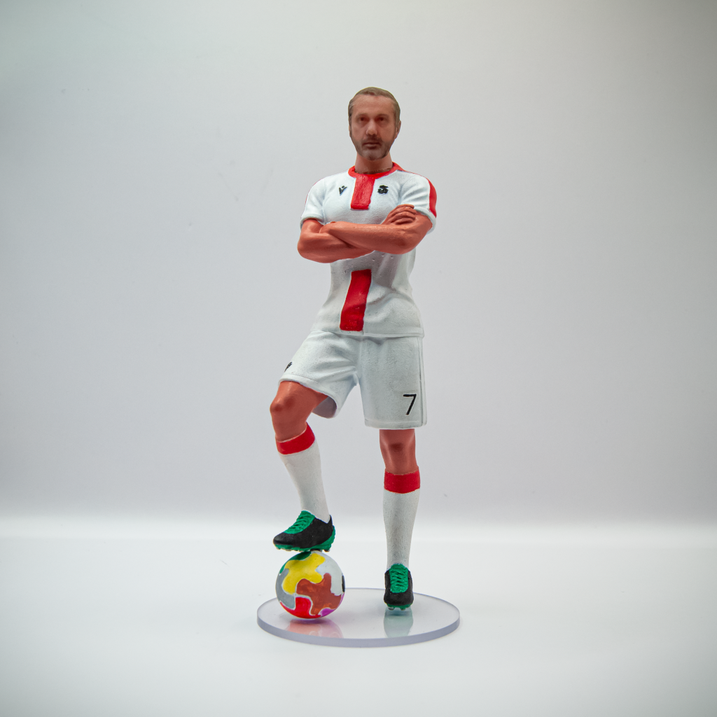 ფეხბურთელი ბურთით